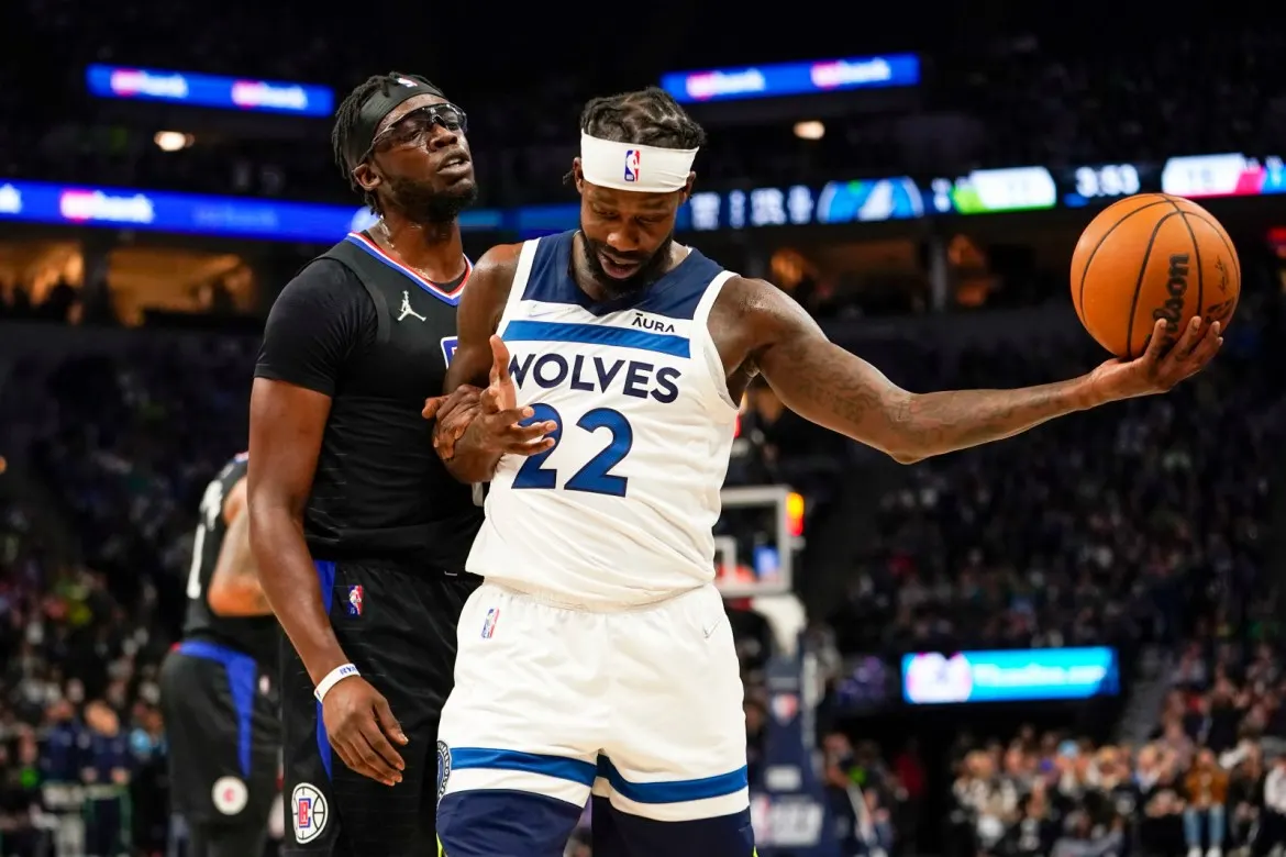 Watch: Protester halts Clippers-Timberwolves trying to glue herself to the floor