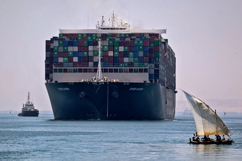 Megaship that blocked Suez crosses canal again