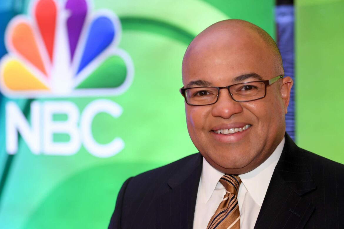 Mike Tirico’s umbrella for Sunday Night Football is made for a literal giant (Photo)