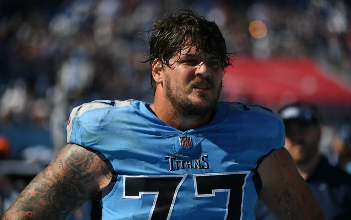 Taylor Lewan injury: Titans OT stretchered off after scary play