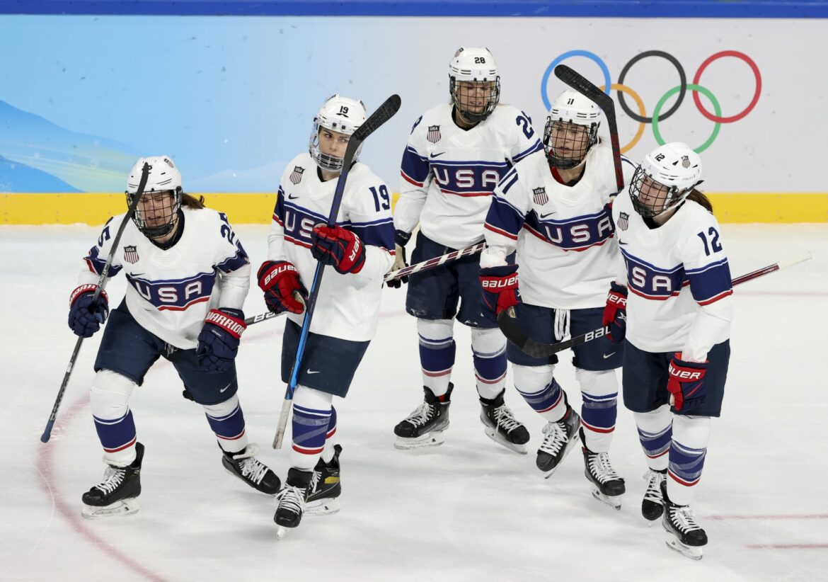 Winter Olympics: USA women’s hockey shows up to cheer on their figure skating teammates
