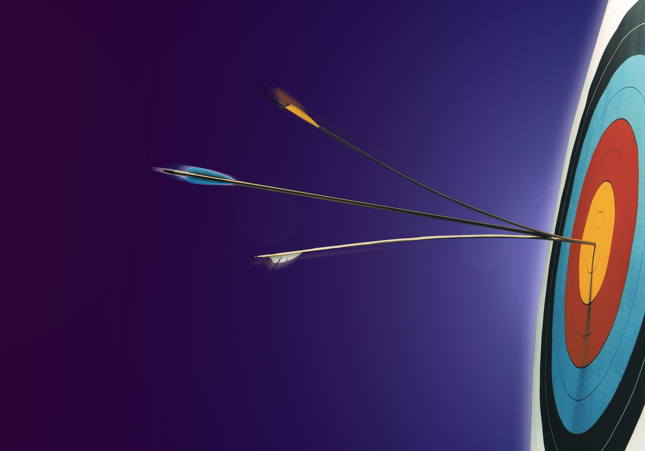 An arrow hitting the bullseye, slicing the earlier arrow in the centre.