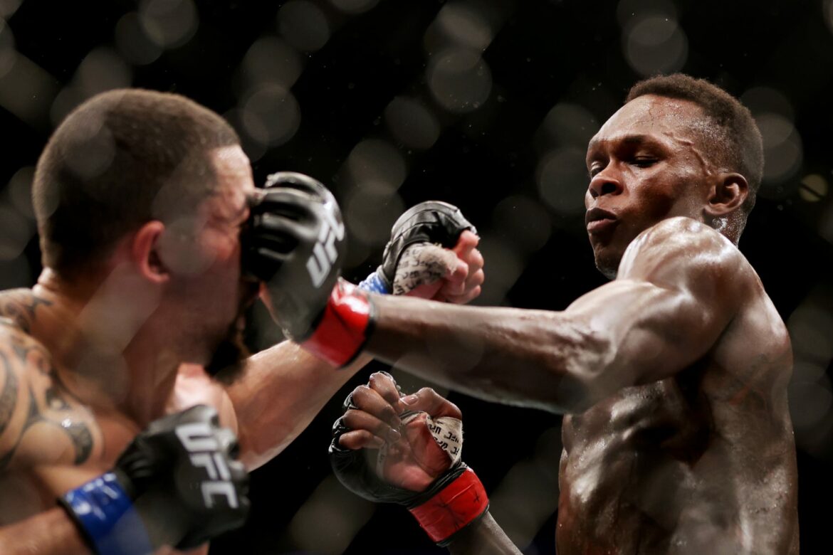 UFC 271: Israel Adesanya outlasts Robert Whittaker in middleweight title rematch (Video)