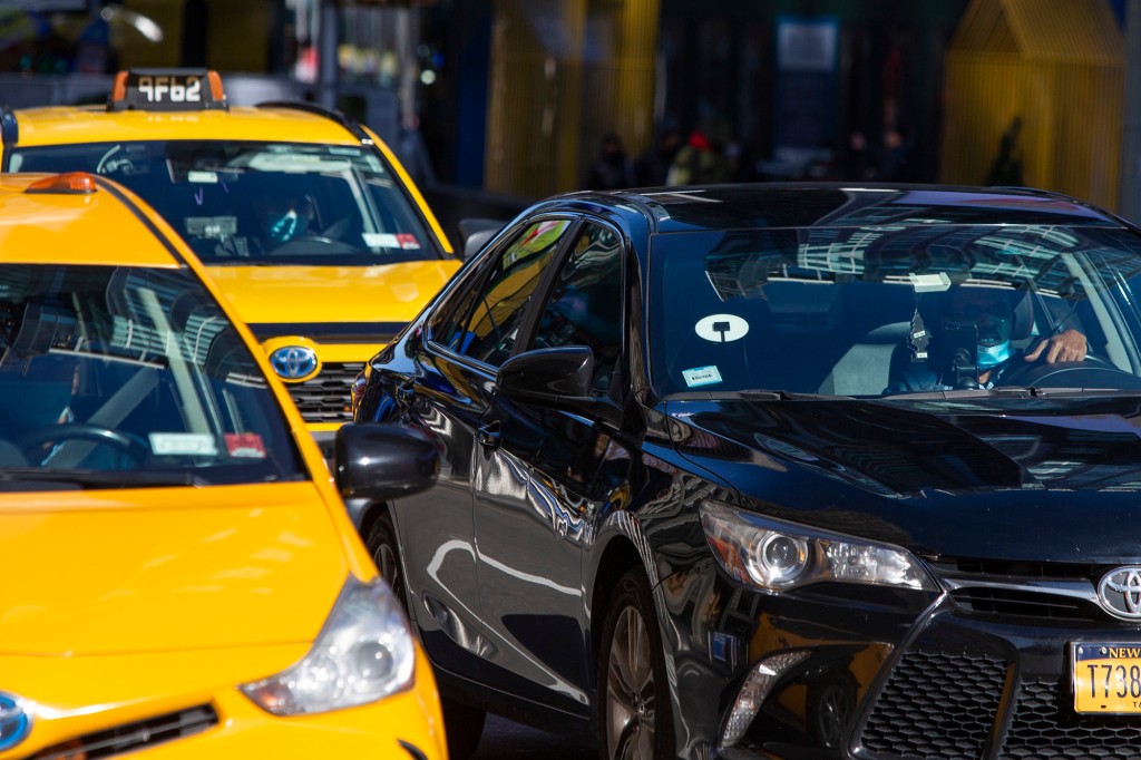 Ubers and taxis on NYC streets